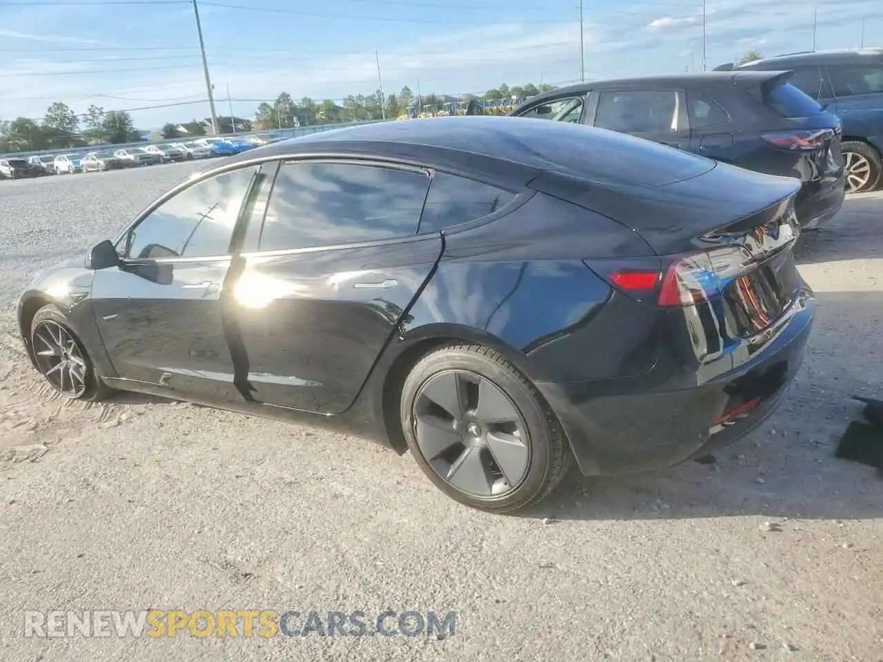 2 Photograph of a damaged car 5YJ3E1EB4NF177836 TESLA MODEL 3 2022