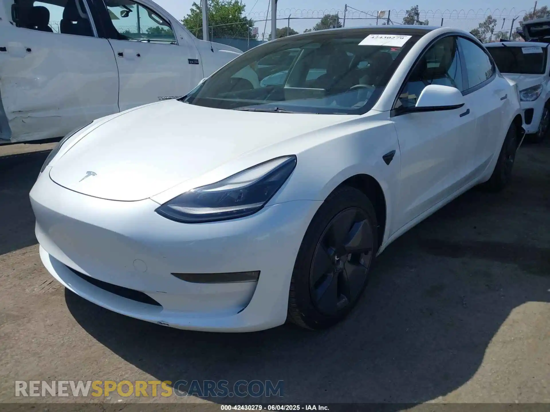 2 Photograph of a damaged car 5YJ3E1EB4NF183958 TESLA MODEL 3 2022