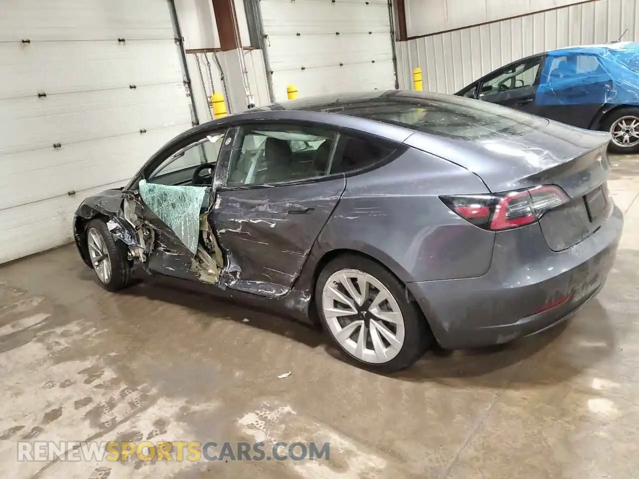 2 Photograph of a damaged car 5YJ3E1EB4NF185130 TESLA MODEL 3 2022