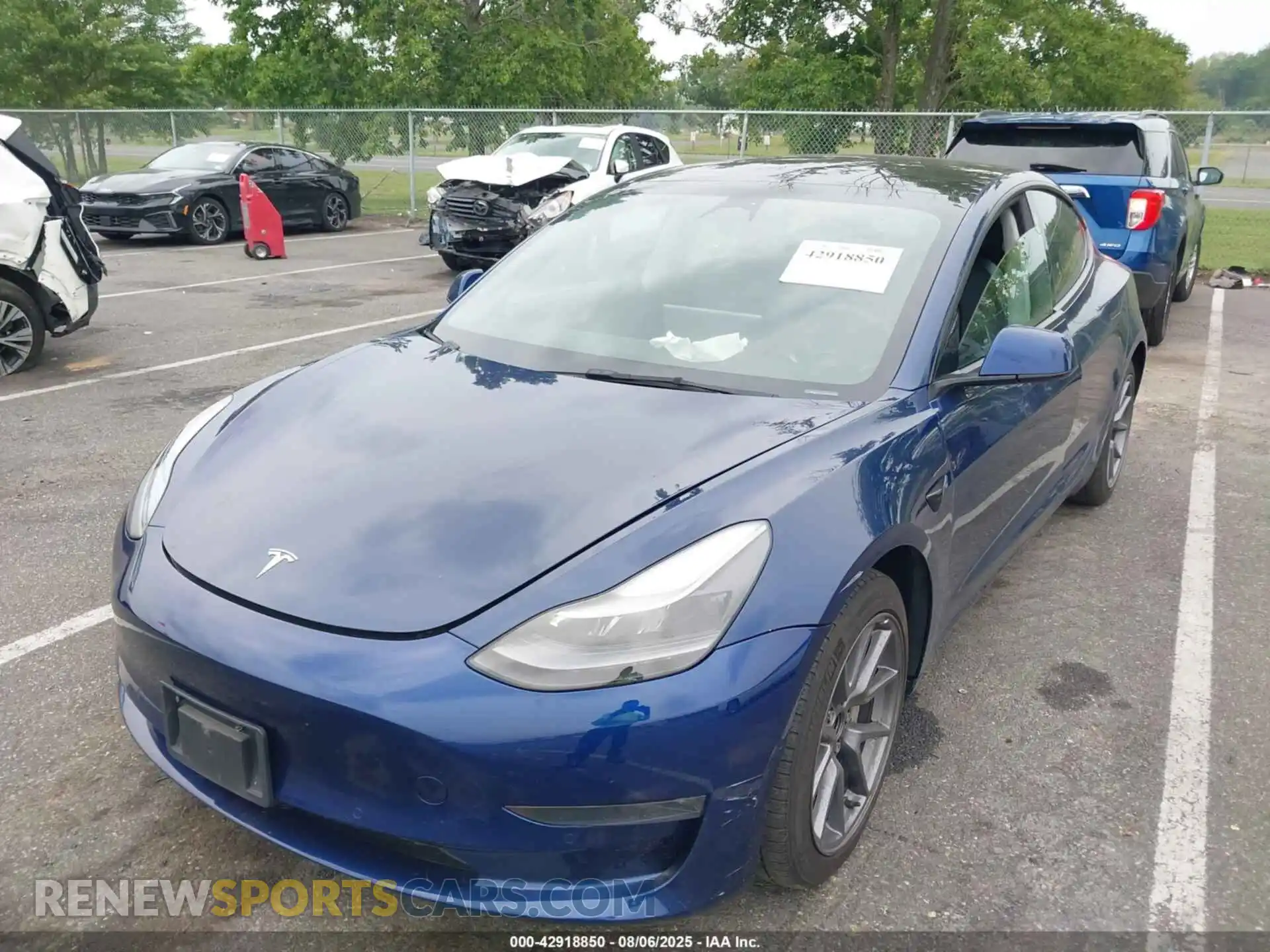2 Photograph of a damaged car 5YJ3E1EB4NF190926 TESLA MODEL 3 2022