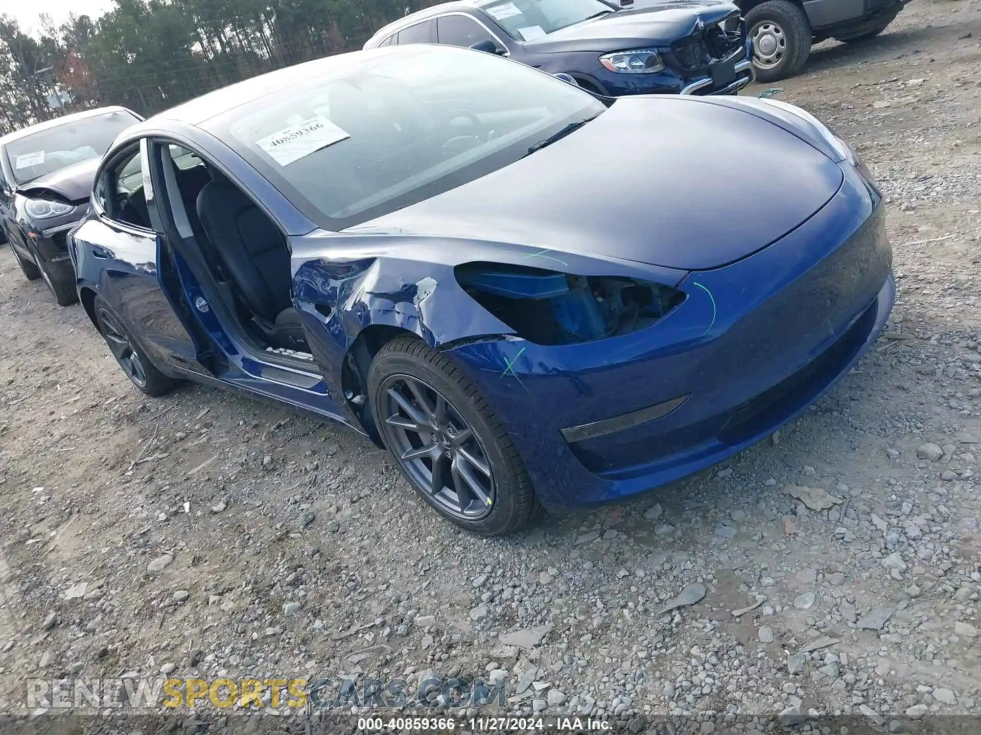 1 Photograph of a damaged car 5YJ3E1EB4NF197861 TESLA MODEL 3 2022