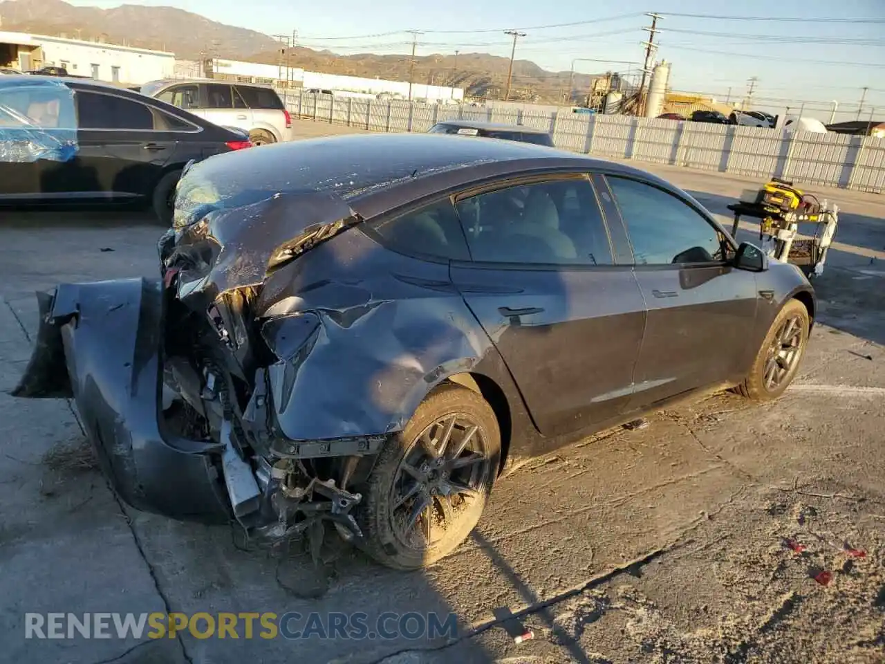 3 Фотография поврежденного автомобиля 5YJ3E1EB4NF200676 TESLA MODEL 3 2022