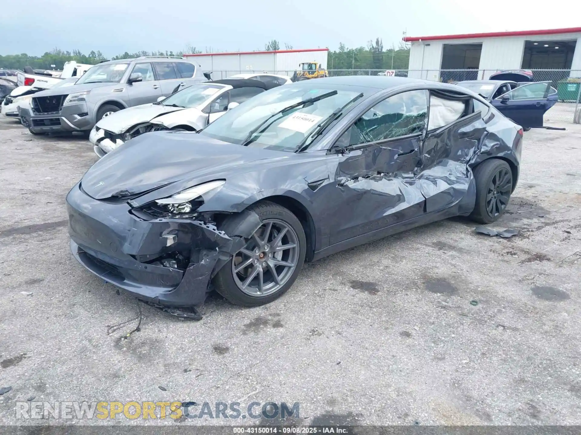 2 Photograph of a damaged car 5YJ3E1EB4NF201746 TESLA MODEL 3 2022