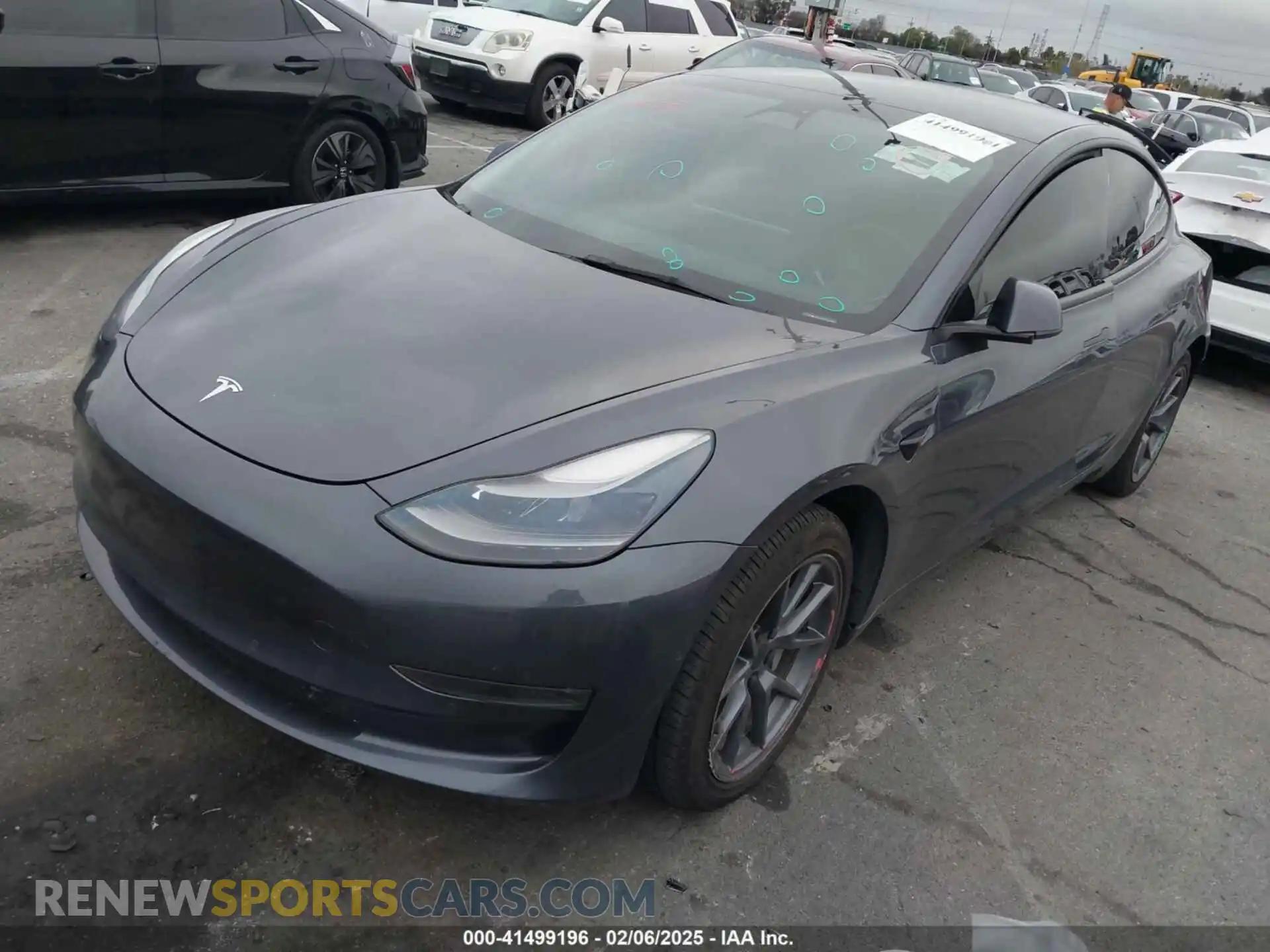 2 Photograph of a damaged car 5YJ3E1EB4NF255905 TESLA MODEL 3 2022