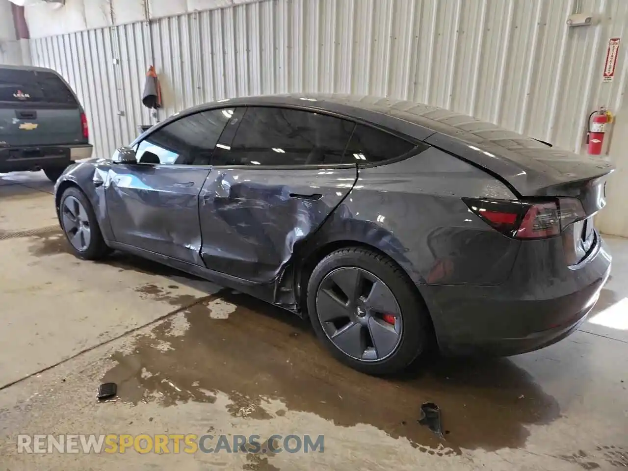 2 Photograph of a damaged car 5YJ3E1EB4NF263079 TESLA MODEL 3 2022