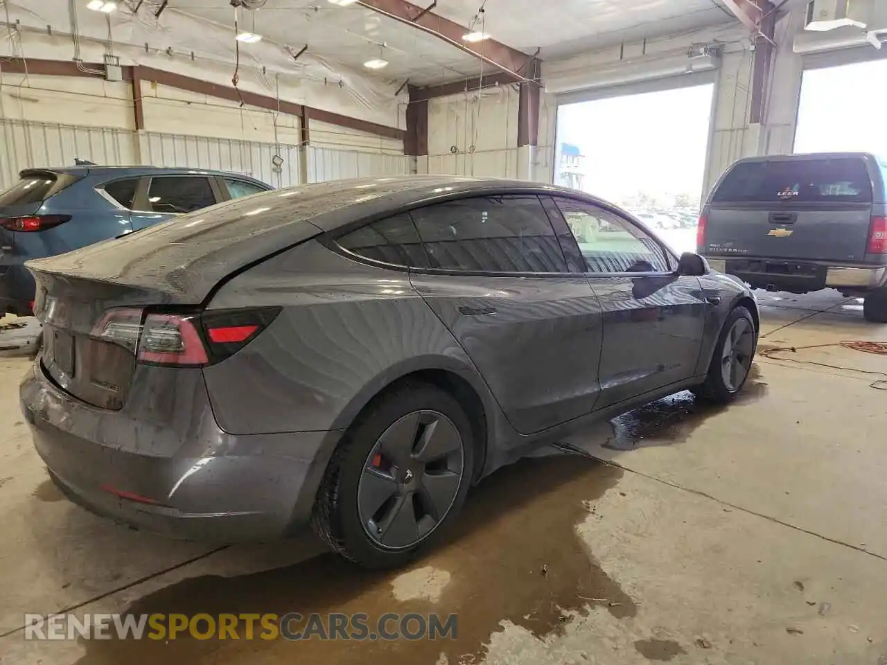 3 Photograph of a damaged car 5YJ3E1EB4NF263079 TESLA MODEL 3 2022