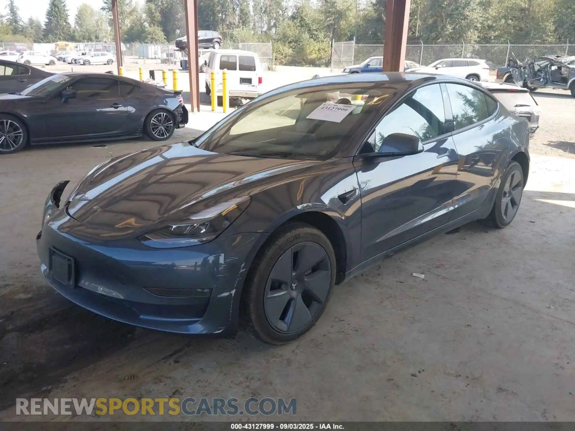 2 Photograph of a damaged car 5YJ3E1EB4NF274079 TESLA MODEL 3 2022