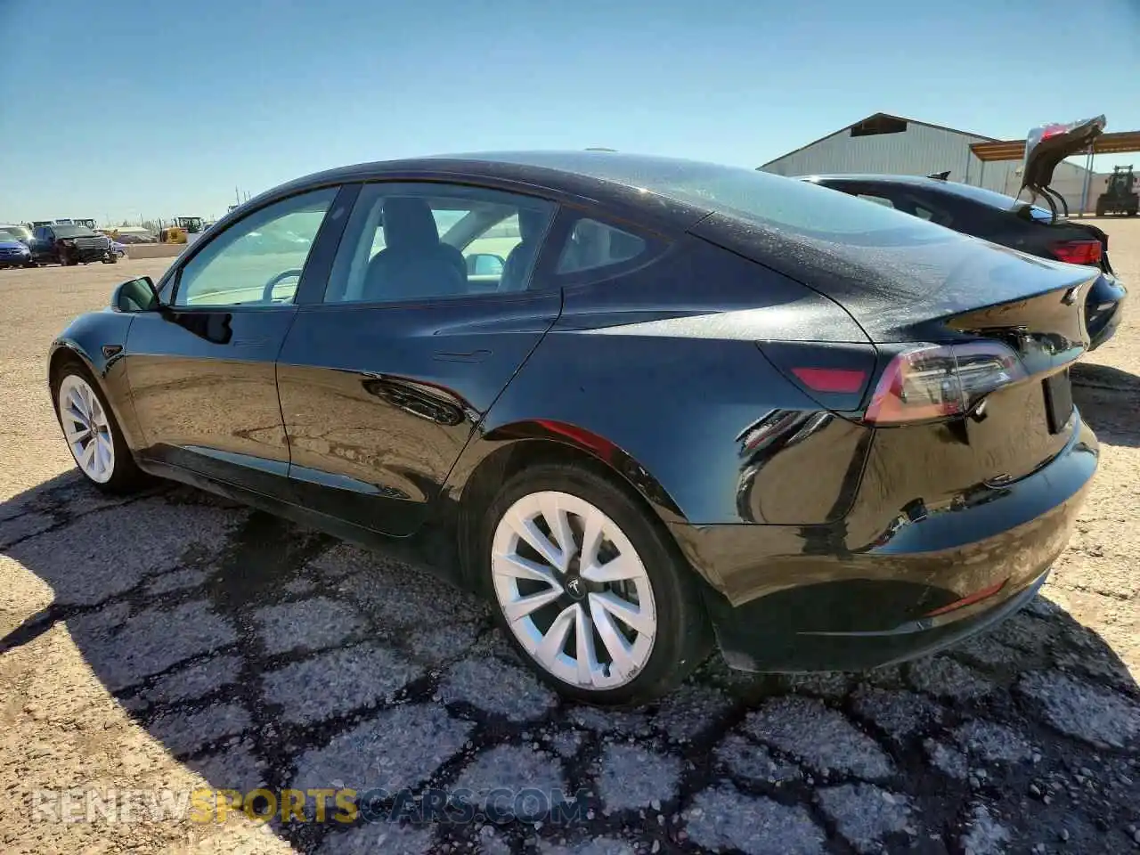 2 fotografías del automóvil dañado 5YJ3E1EB4NF288970 TESLA MODEL 3 2022