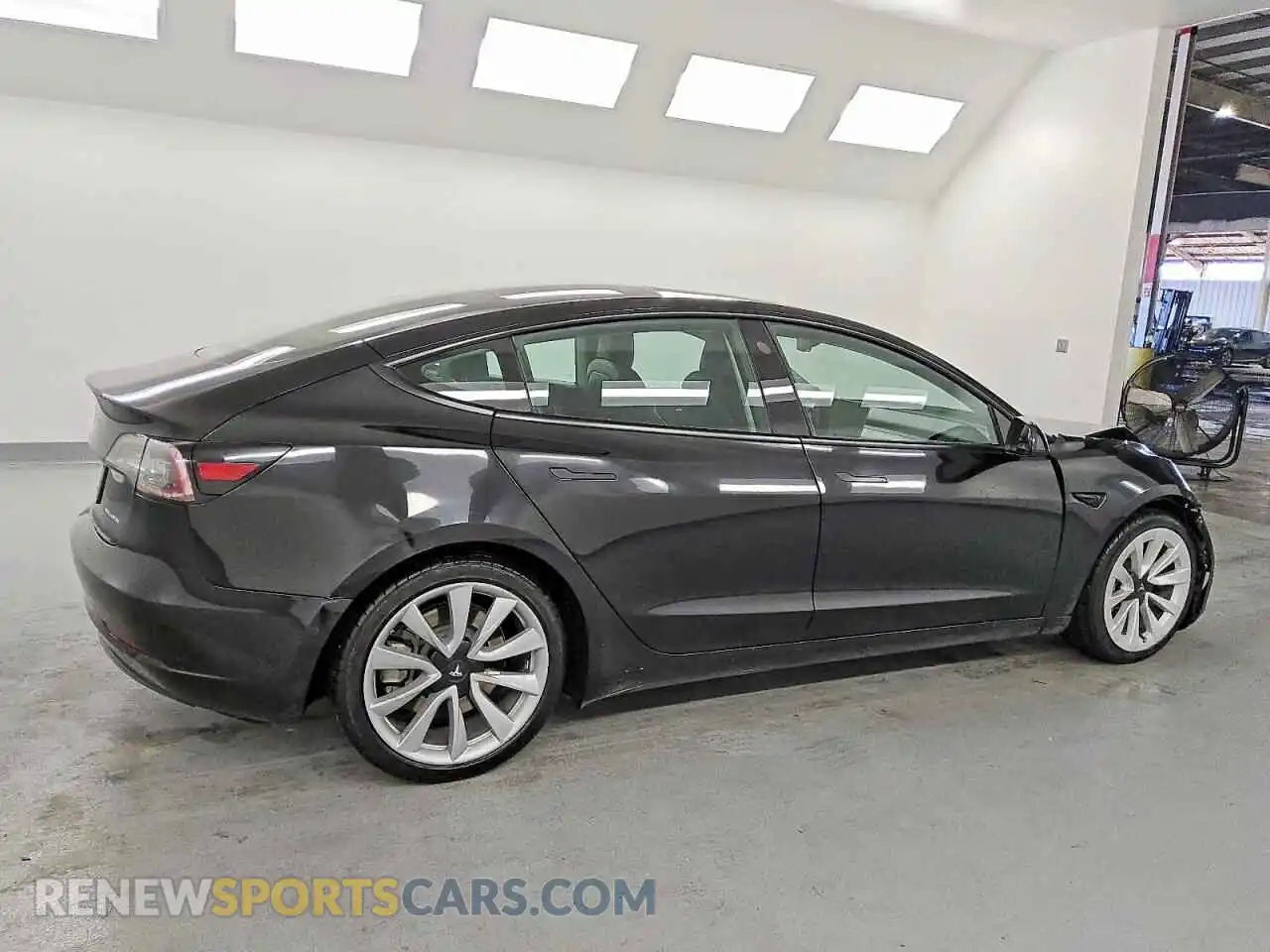 3 Photograph of a damaged car 5YJ3E1EB4NF305136 TESLA MODEL 3 2022