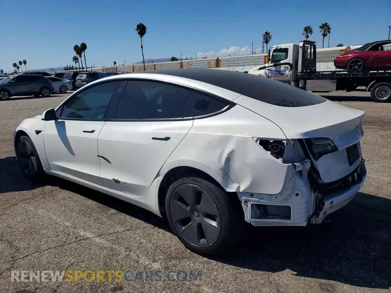 2 Photograph of a damaged car 5YJ3E1EB4NF307825 TESLA MODEL 3 2022