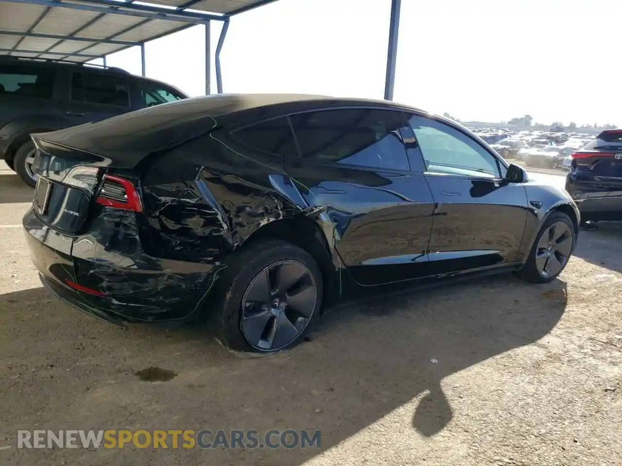 3 Photograph of a damaged car 5YJ3E1EB4NF329064 TESLA MODEL 3 2022