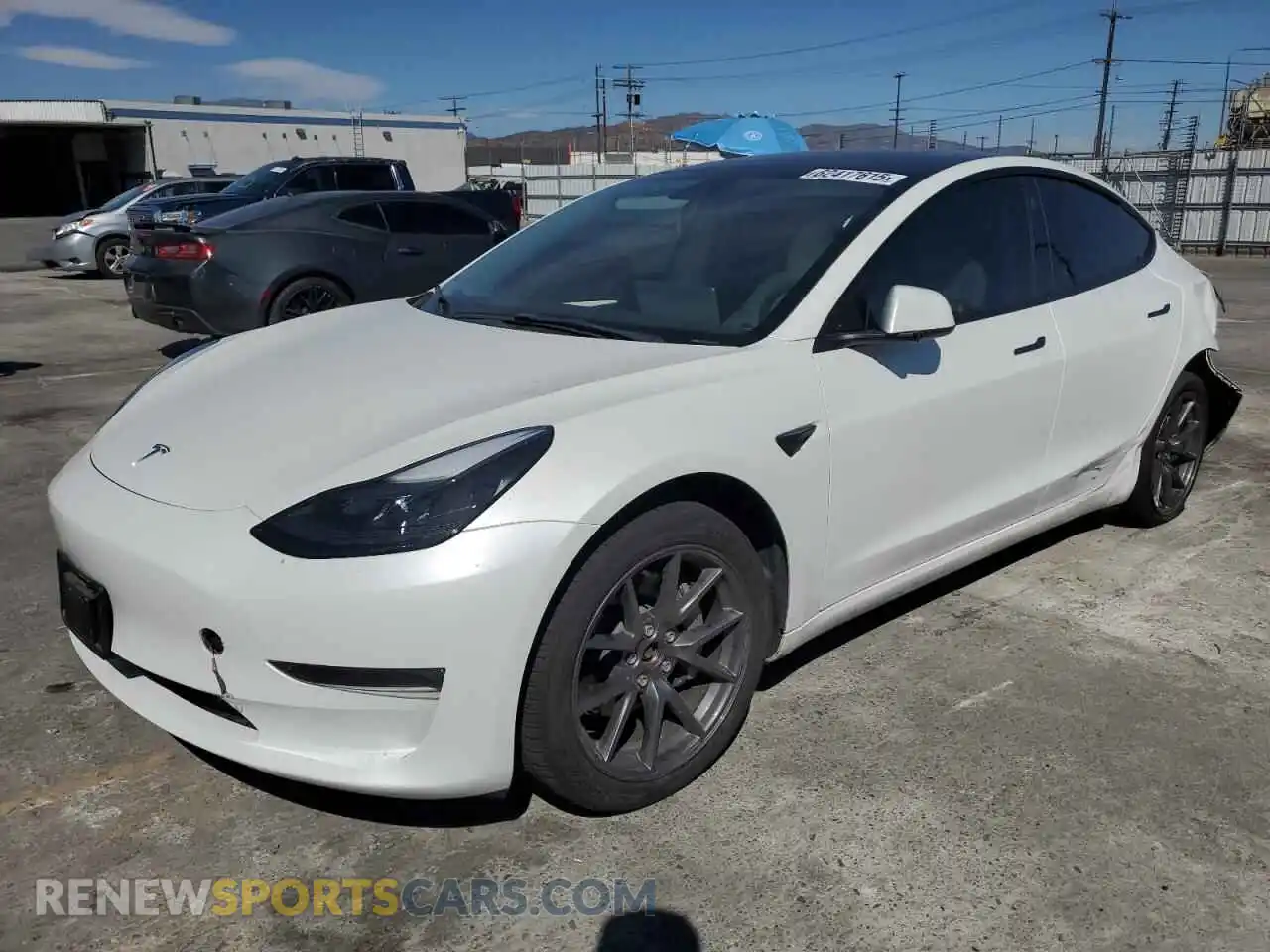 1 Photograph of a damaged car 5YJ3E1EB4NF337469 TESLA MODEL 3 2022