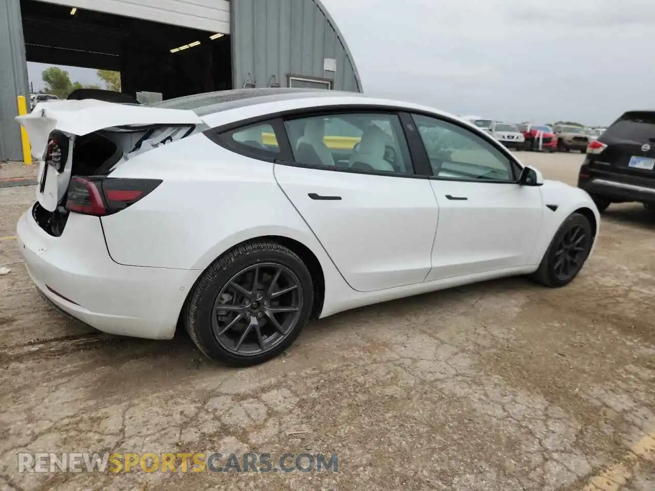 3 Photograph of a damaged car 5YJ3E1EB5NF101154 TESLA MODEL 3 2022