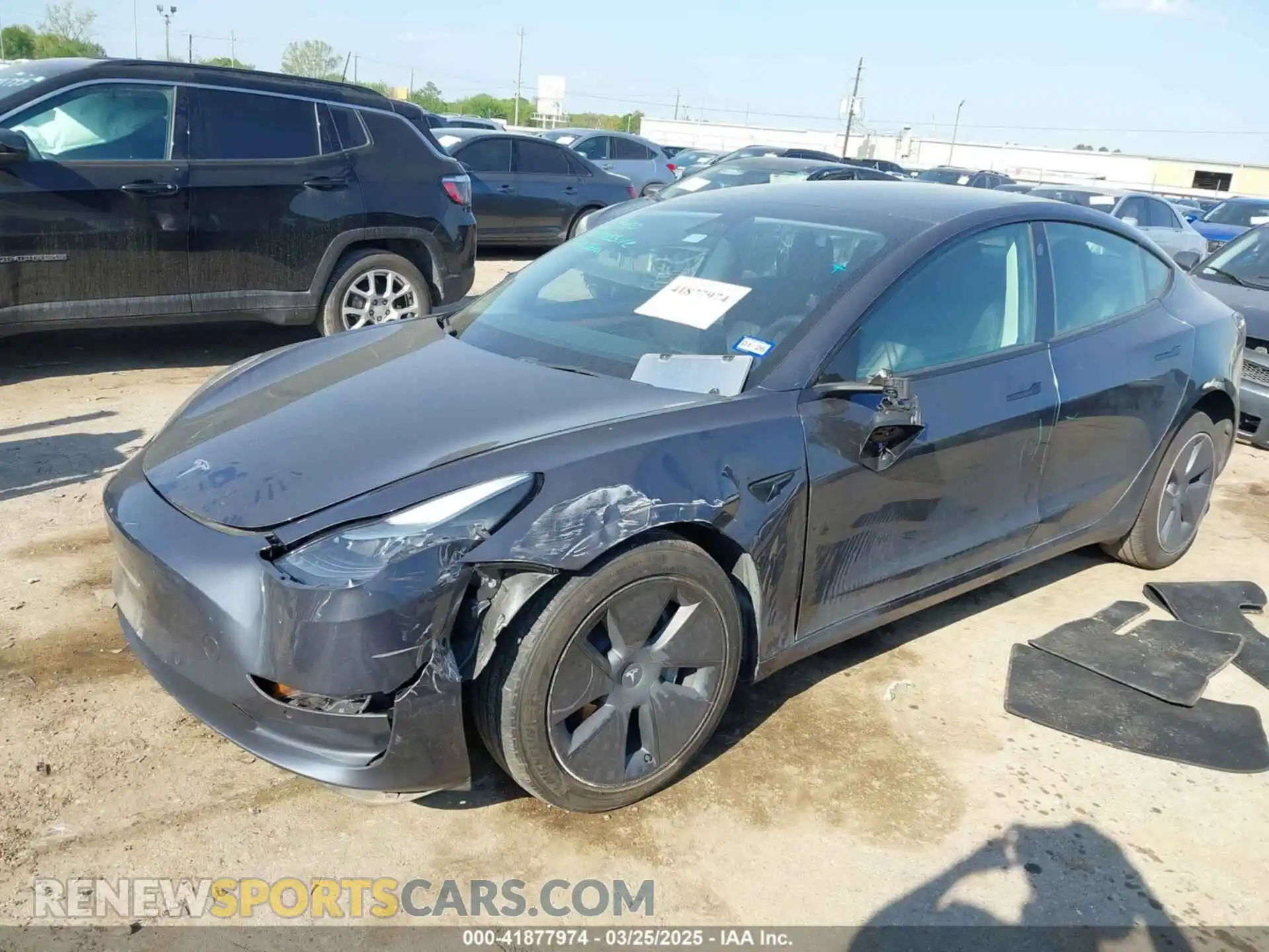 2 Photograph of a damaged car 5YJ3E1EB5NF124286 TESLA MODEL 3 2022