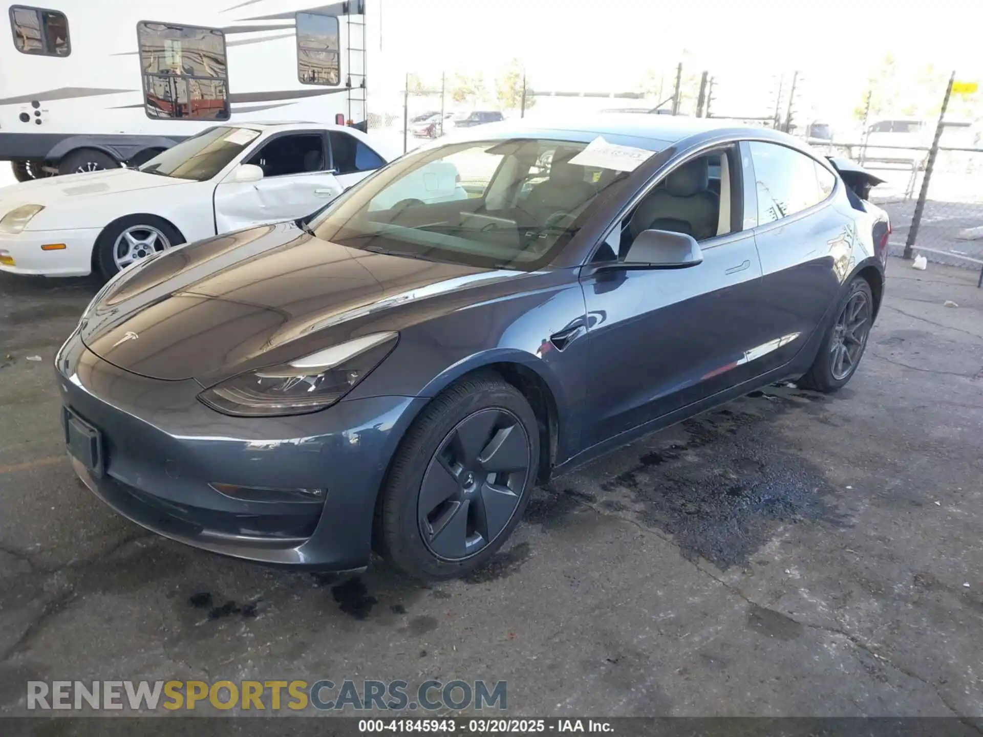 2 Photograph of a damaged car 5YJ3E1EB5NF126104 TESLA MODEL 3 2022