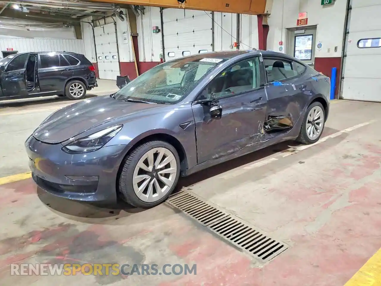 1 Photograph of a damaged car 5YJ3E1EB5NF127382 TESLA MODEL 3 2022