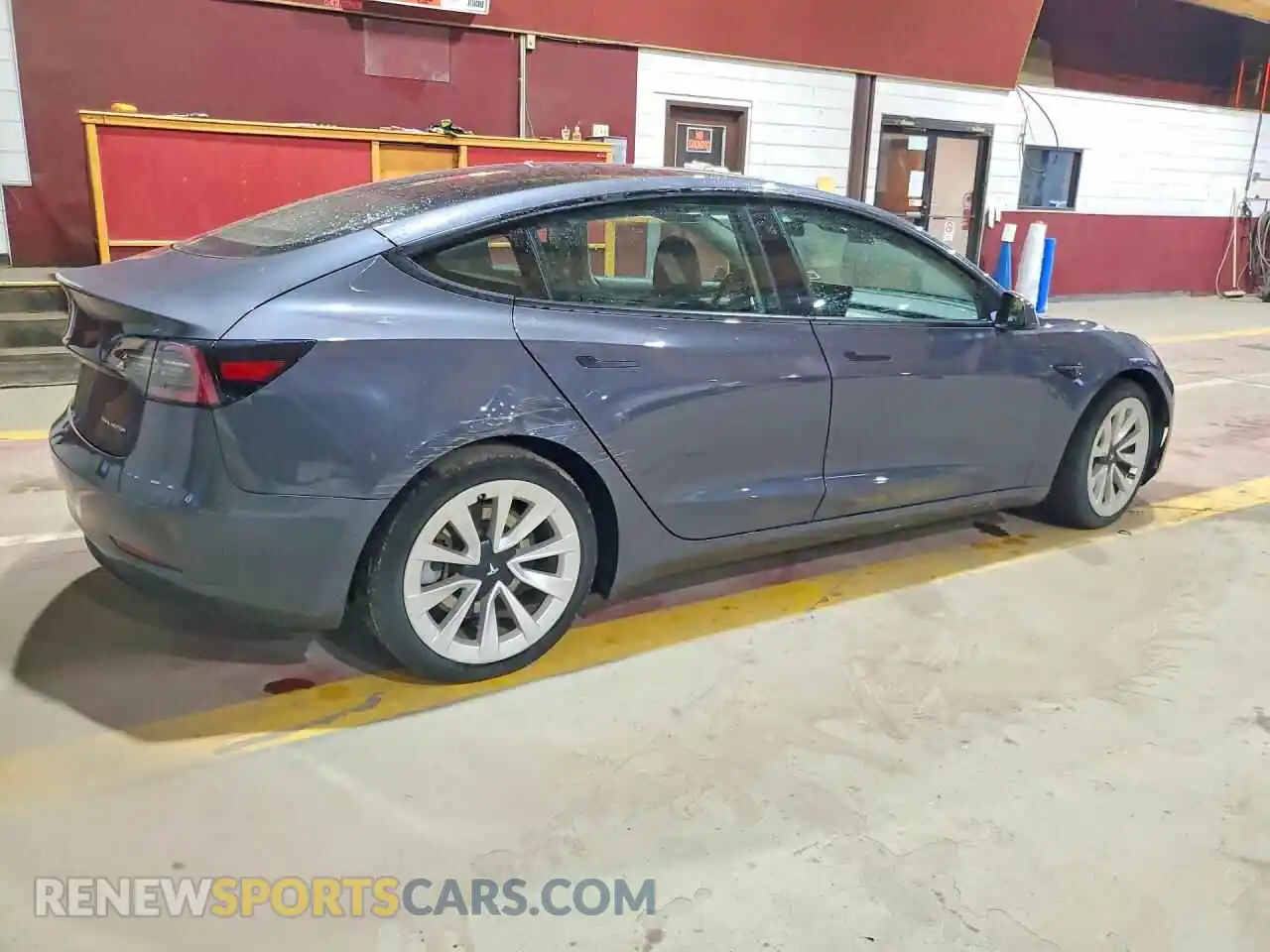 3 Photograph of a damaged car 5YJ3E1EB5NF127382 TESLA MODEL 3 2022