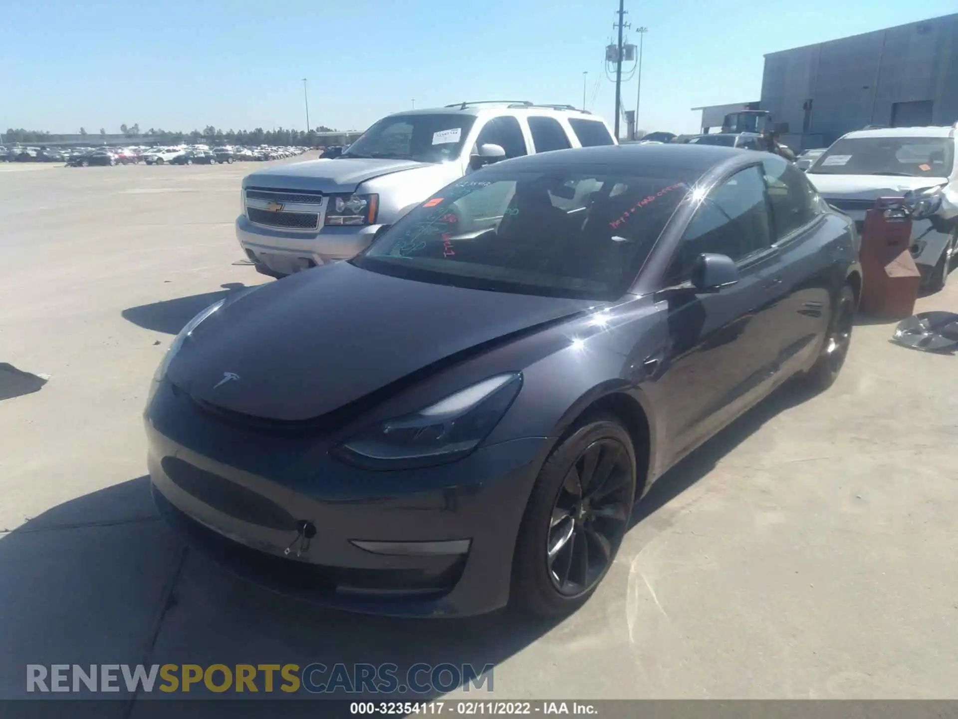 2 Photograph of a damaged car 5YJ3E1EB5NF128693 TESLA MODEL 3 2022