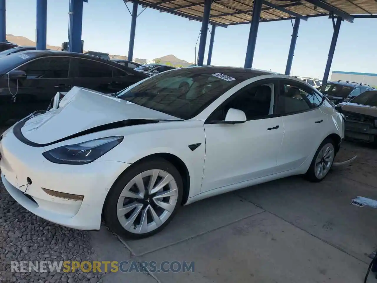 1 Photograph of a damaged car 5YJ3E1EB5NF129360 TESLA MODEL 3 2022