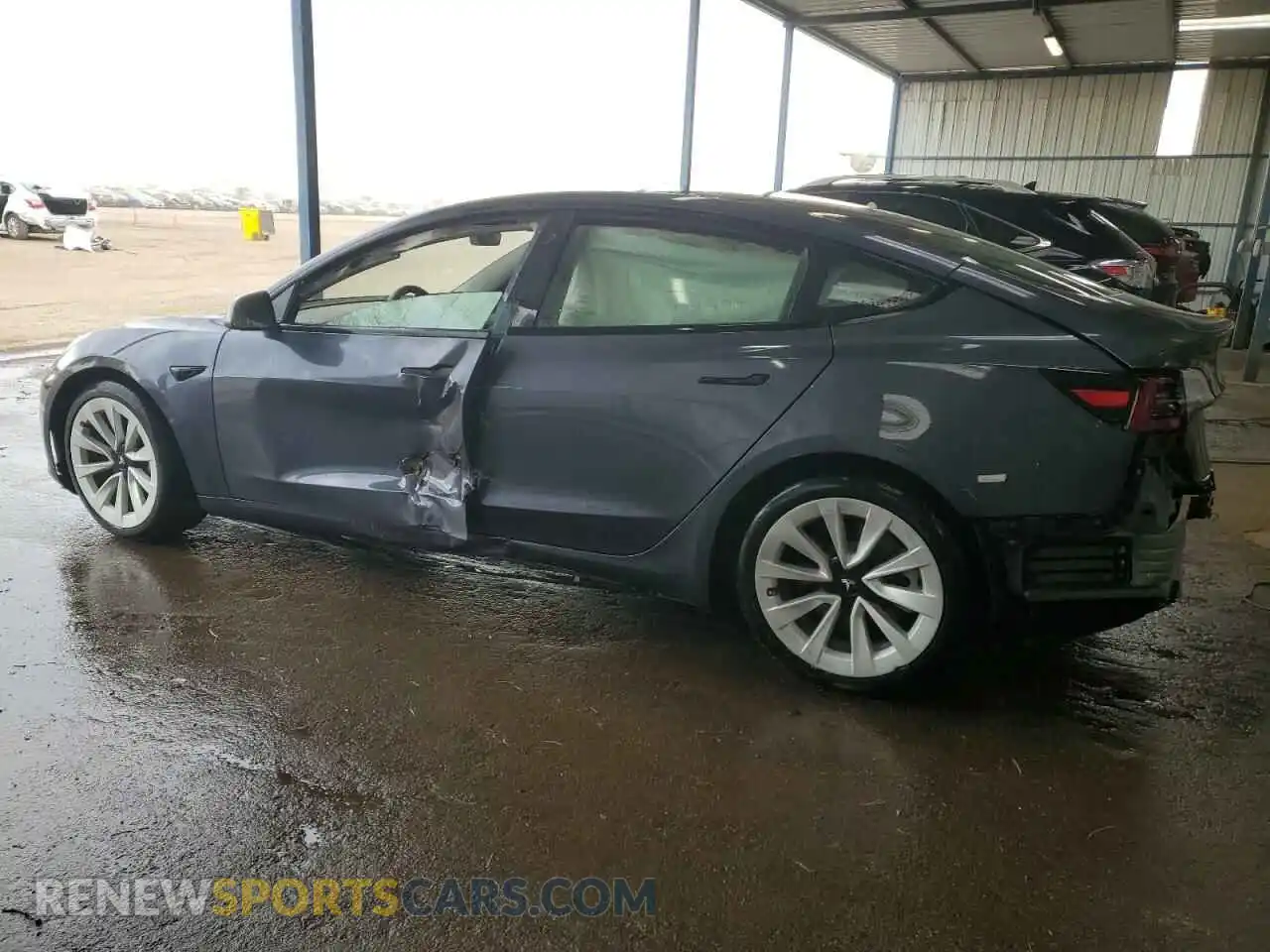 2 Photograph of a damaged car 5YJ3E1EB5NF174301 TESLA MODEL 3 2022
