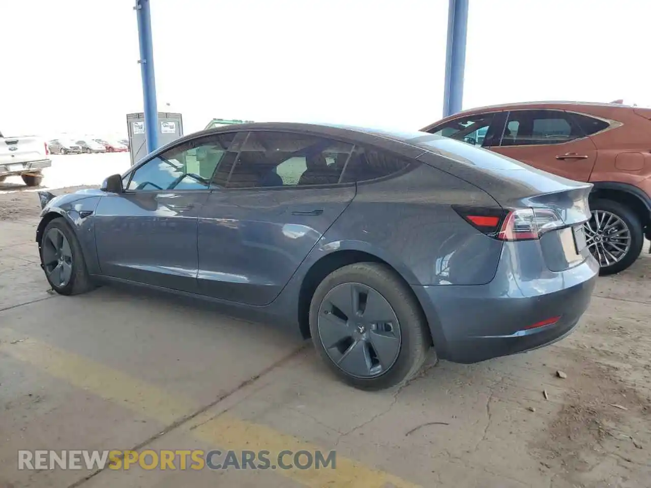 2 Photograph of a damaged car 5YJ3E1EB5NF174654 TESLA MODEL 3 2022