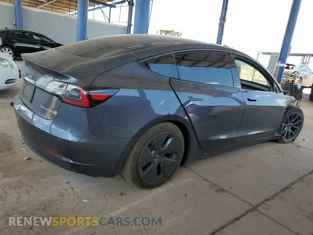 3 Photograph of a damaged car 5YJ3E1EB5NF174654 TESLA MODEL 3 2022