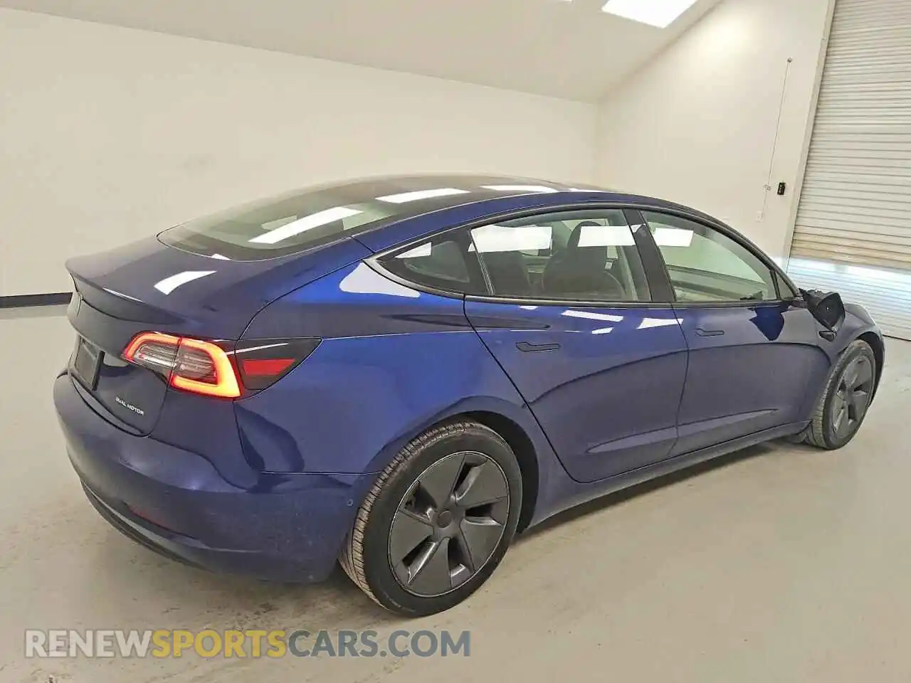 3 Photograph of a damaged car 5YJ3E1EB5NF176386 TESLA MODEL 3 2022