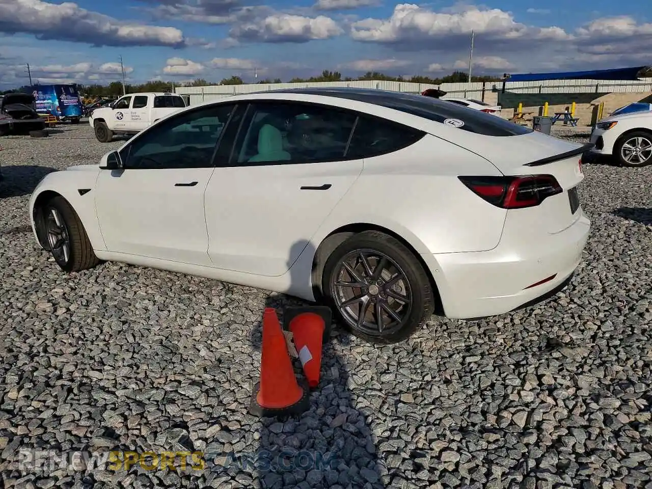 2 Photograph of a damaged car 5YJ3E1EB5NF183158 TESLA MODEL 3 2022