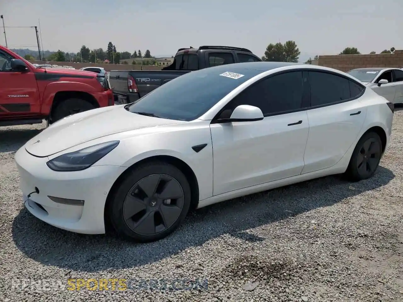 1 Photograph of a damaged car 5YJ3E1EB5NF183533 TESLA MODEL 3 2022
