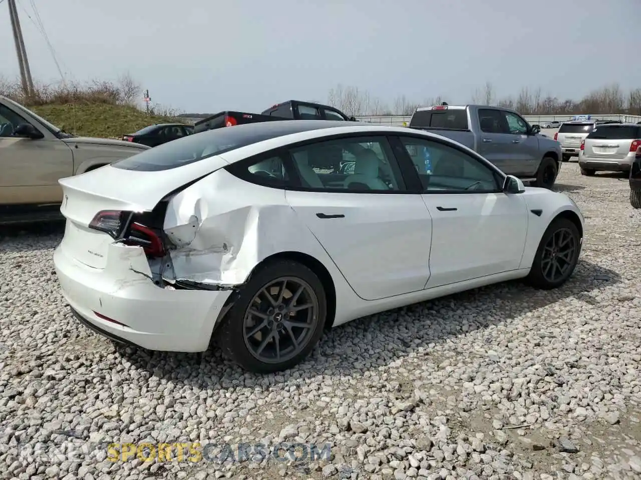 3 Photograph of a damaged car 5YJ3E1EB5NF196394 TESLA MODEL 3 2022
