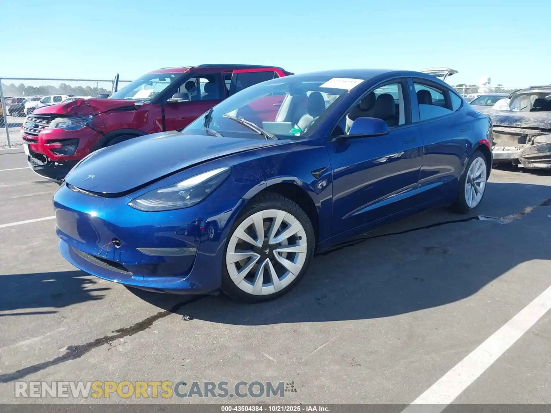 2 Photograph of a damaged car 5YJ3E1EB5NF198582 TESLA MODEL 3 2022