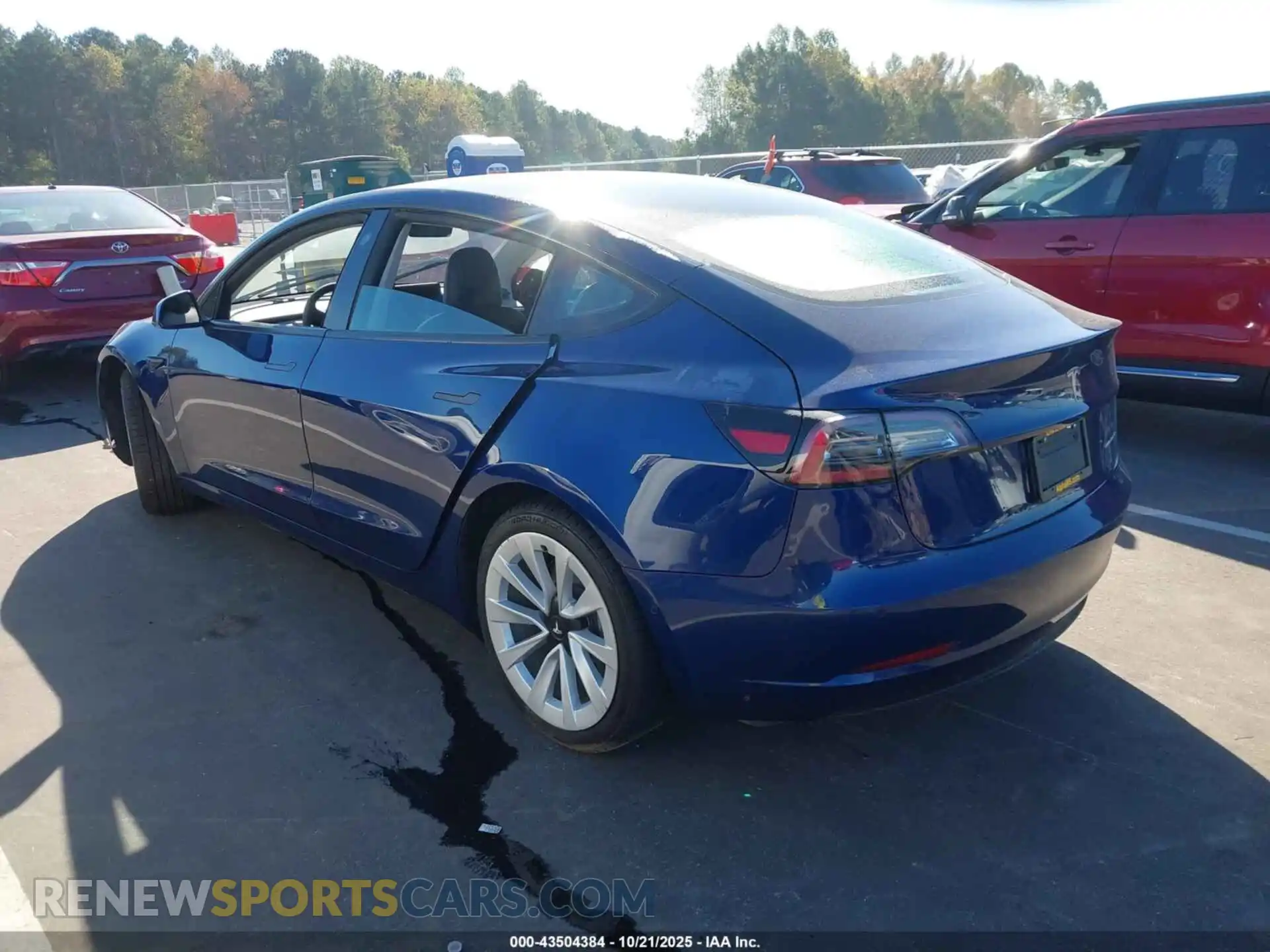 3 Photograph of a damaged car 5YJ3E1EB5NF198582 TESLA MODEL 3 2022