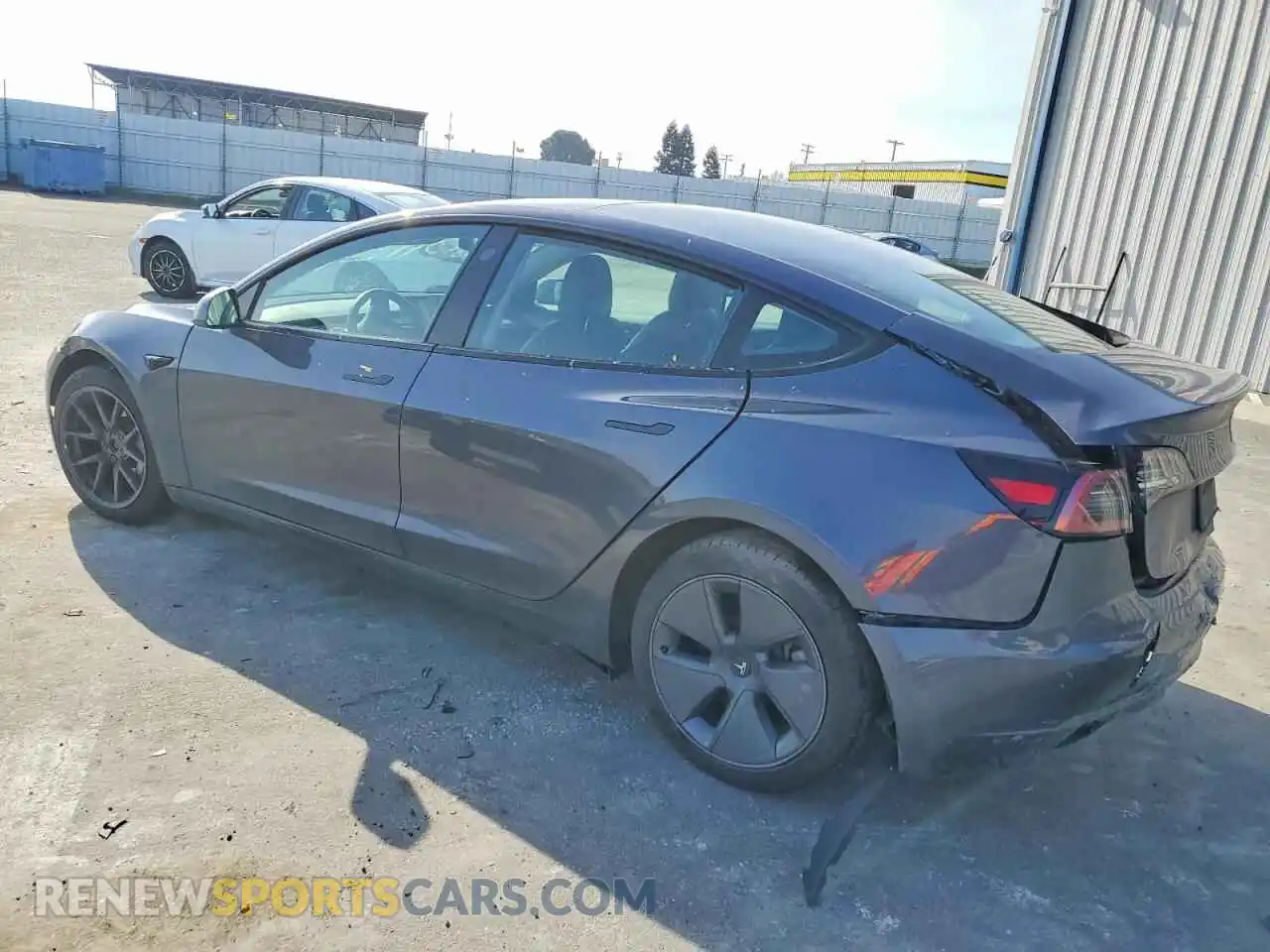 2 Photograph of a damaged car 5YJ3E1EB5NF207555 TESLA MODEL 3 2022