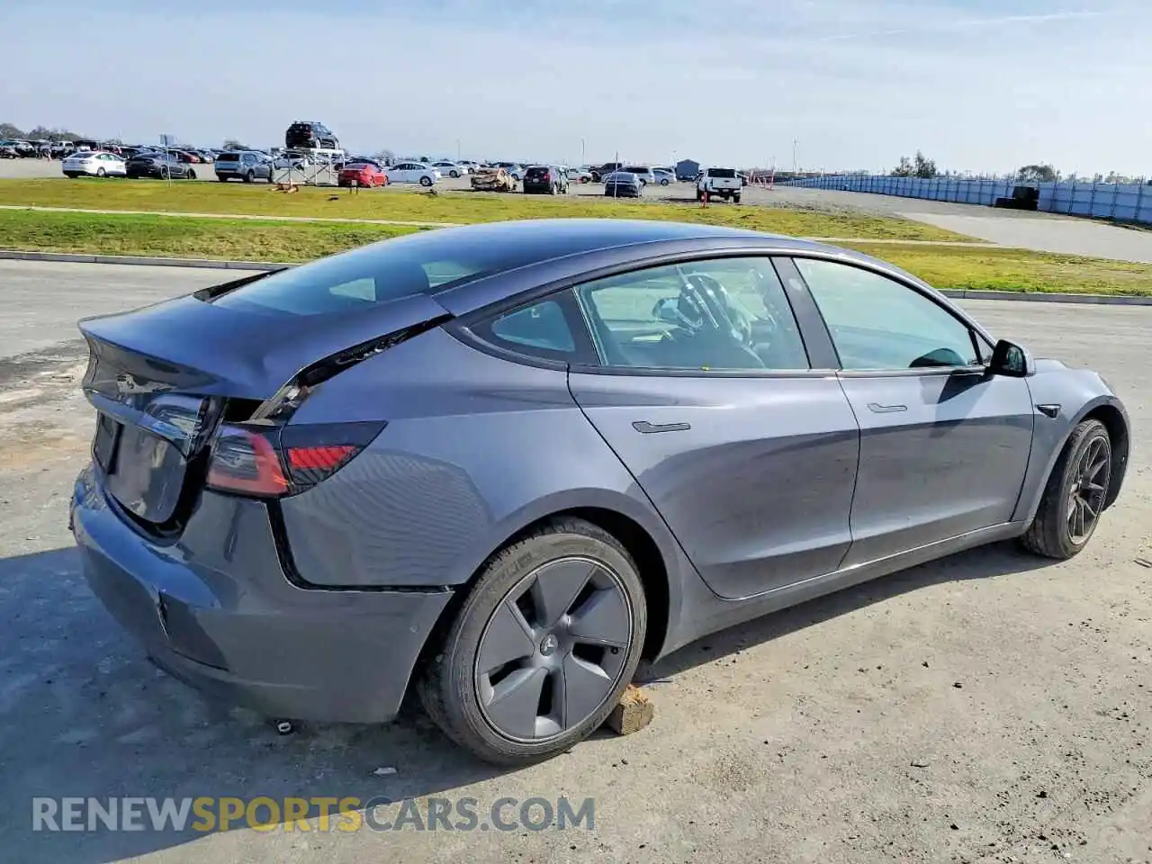 3 Photograph of a damaged car 5YJ3E1EB5NF207555 TESLA MODEL 3 2022