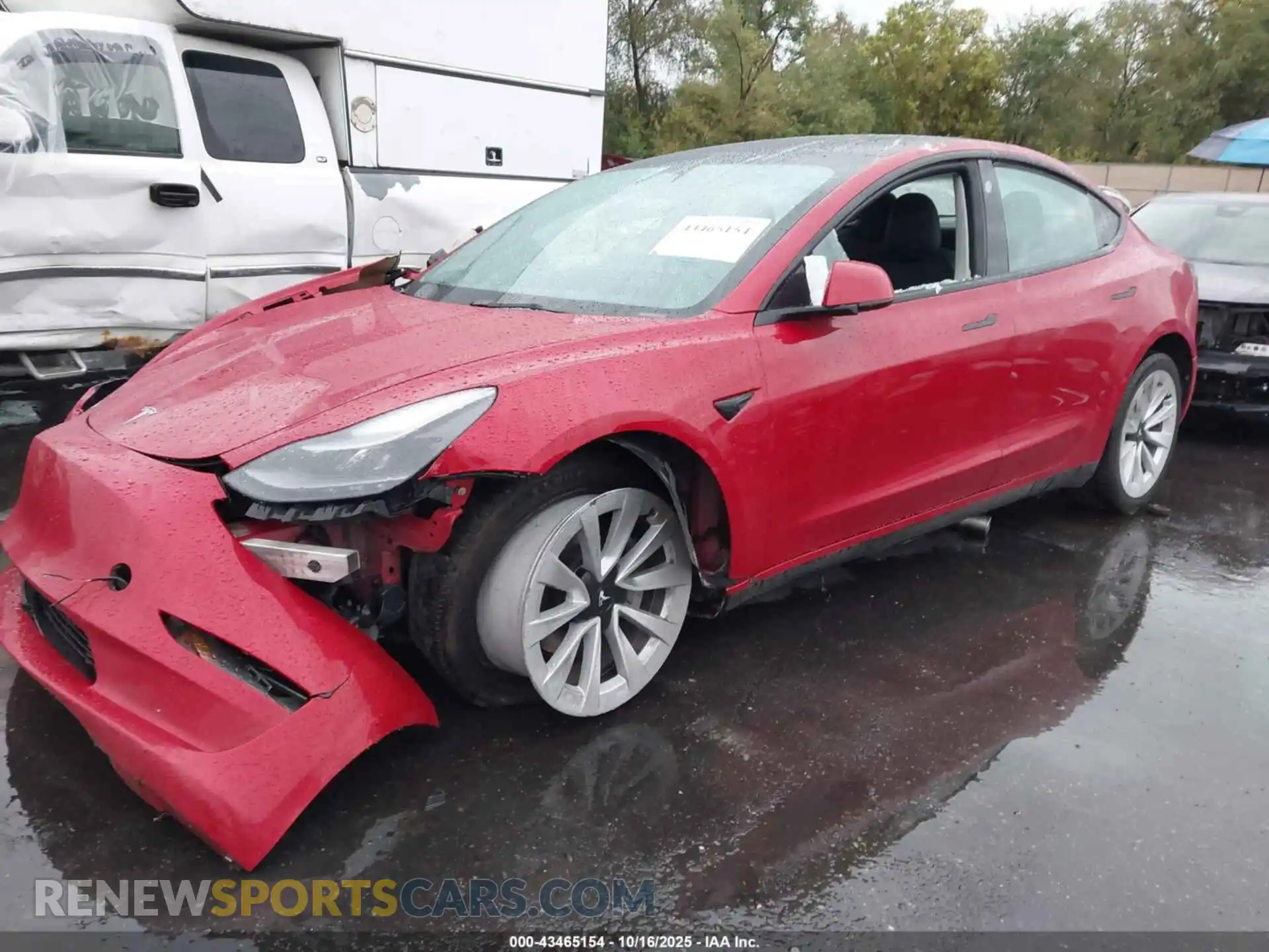 2 Photograph of a damaged car 5YJ3E1EB5NF208754 TESLA MODEL 3 2022