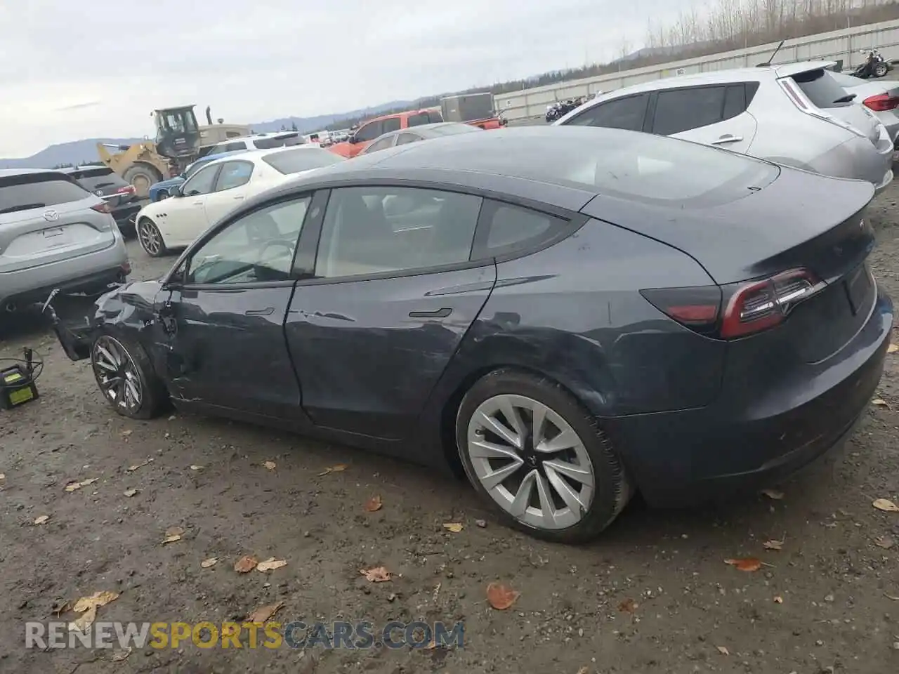 2 Photograph of a damaged car 5YJ3E1EB5NF209175 TESLA MODEL 3 2022