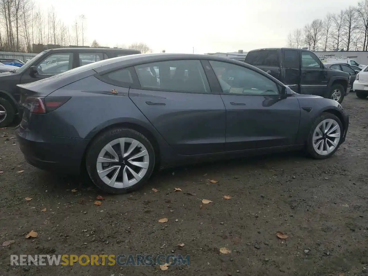 3 Photograph of a damaged car 5YJ3E1EB5NF209175 TESLA MODEL 3 2022