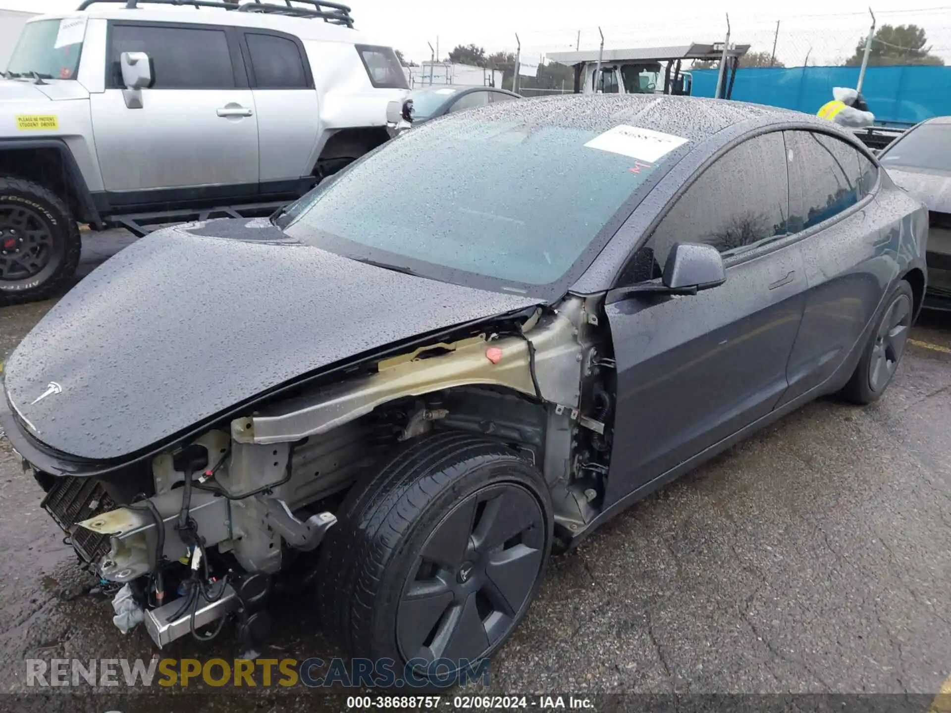 2 Photograph of a damaged car 5YJ3E1EB5NF221990 TESLA MODEL 3 2022