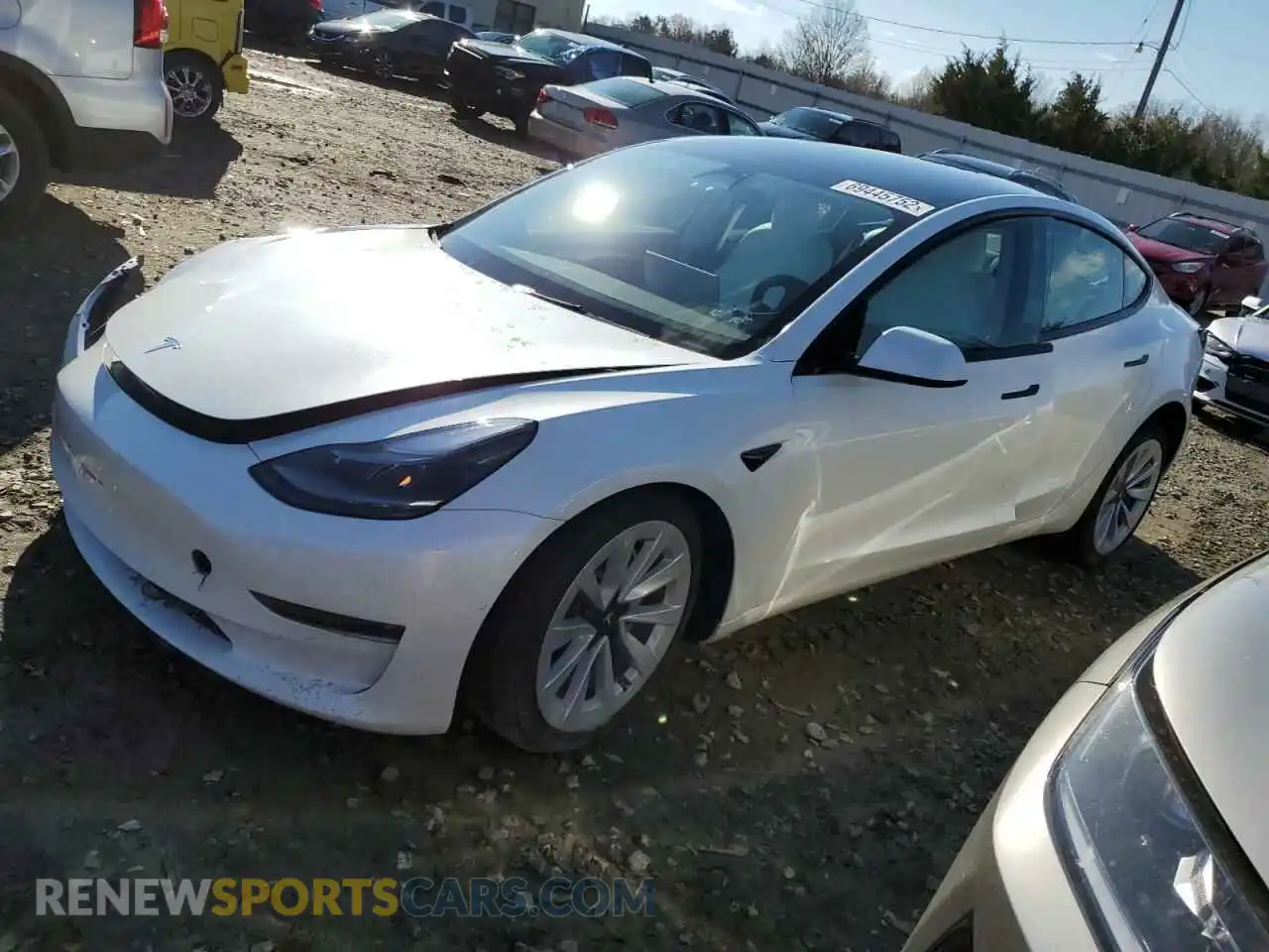 1 Photograph of a damaged car 5YJ3E1EB5NF253340 TESLA MODEL 3 2022