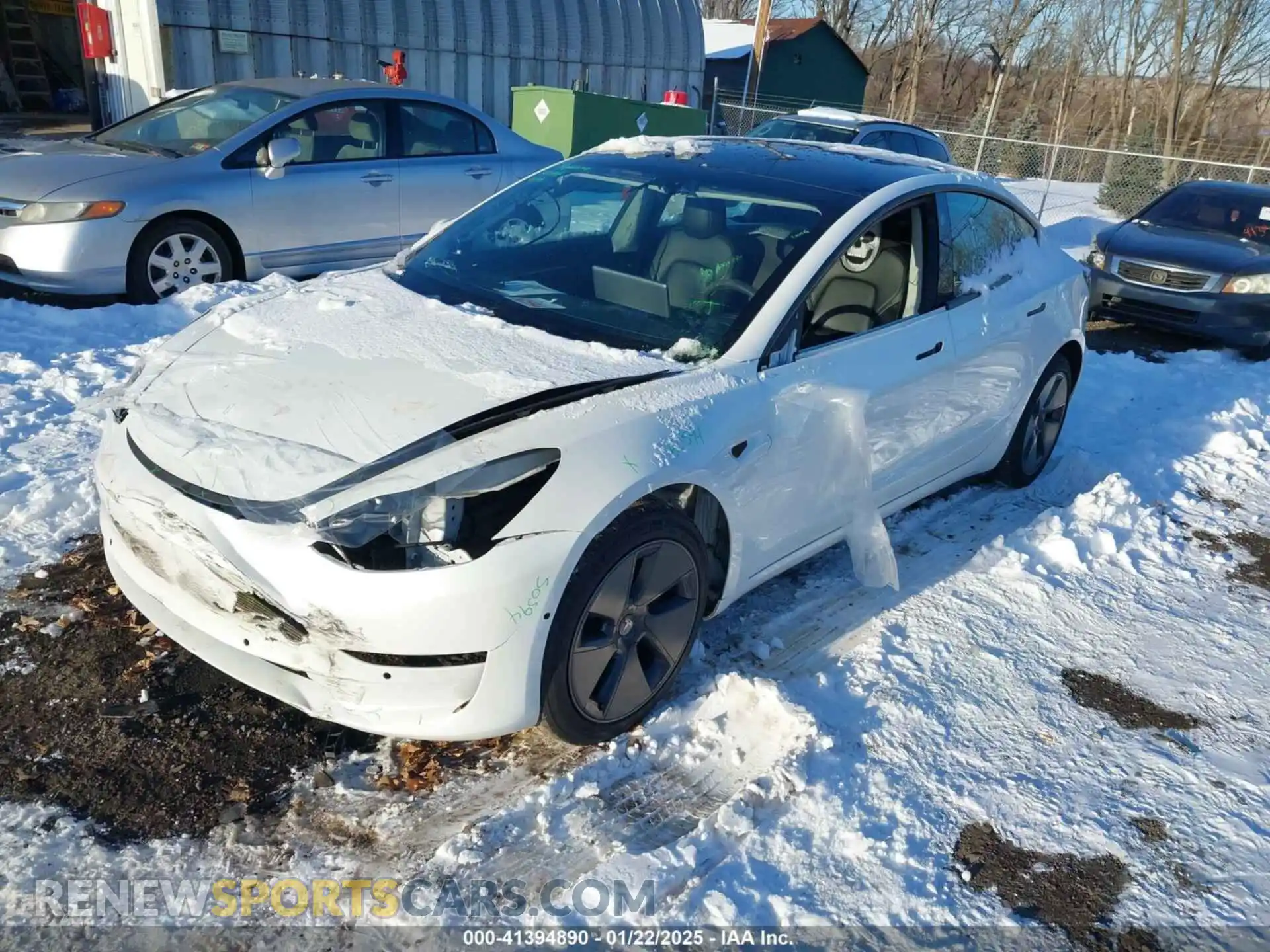 2 fotografías del automóvil dañado 5YJ3E1EB5NF266511 TESLA MODEL 3 2022