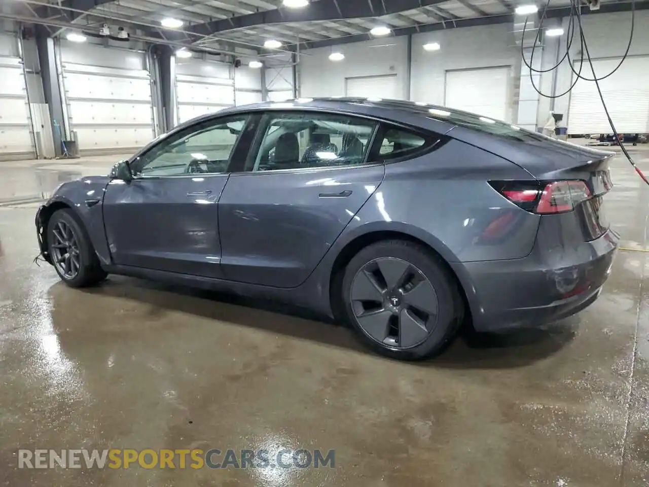 2 Photograph of a damaged car 5YJ3E1EB5NF277735 TESLA MODEL 3 2022