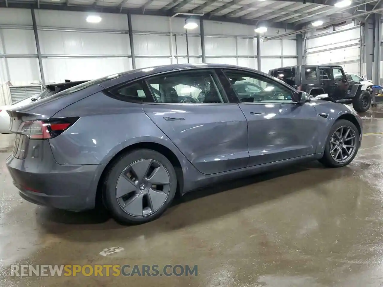 3 Photograph of a damaged car 5YJ3E1EB5NF277735 TESLA MODEL 3 2022