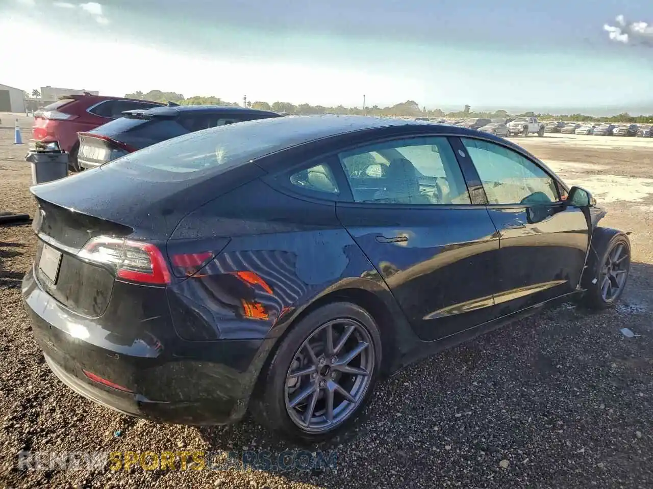 3 Photograph of a damaged car 5YJ3E1EB5NF285592 TESLA MODEL 3 2022