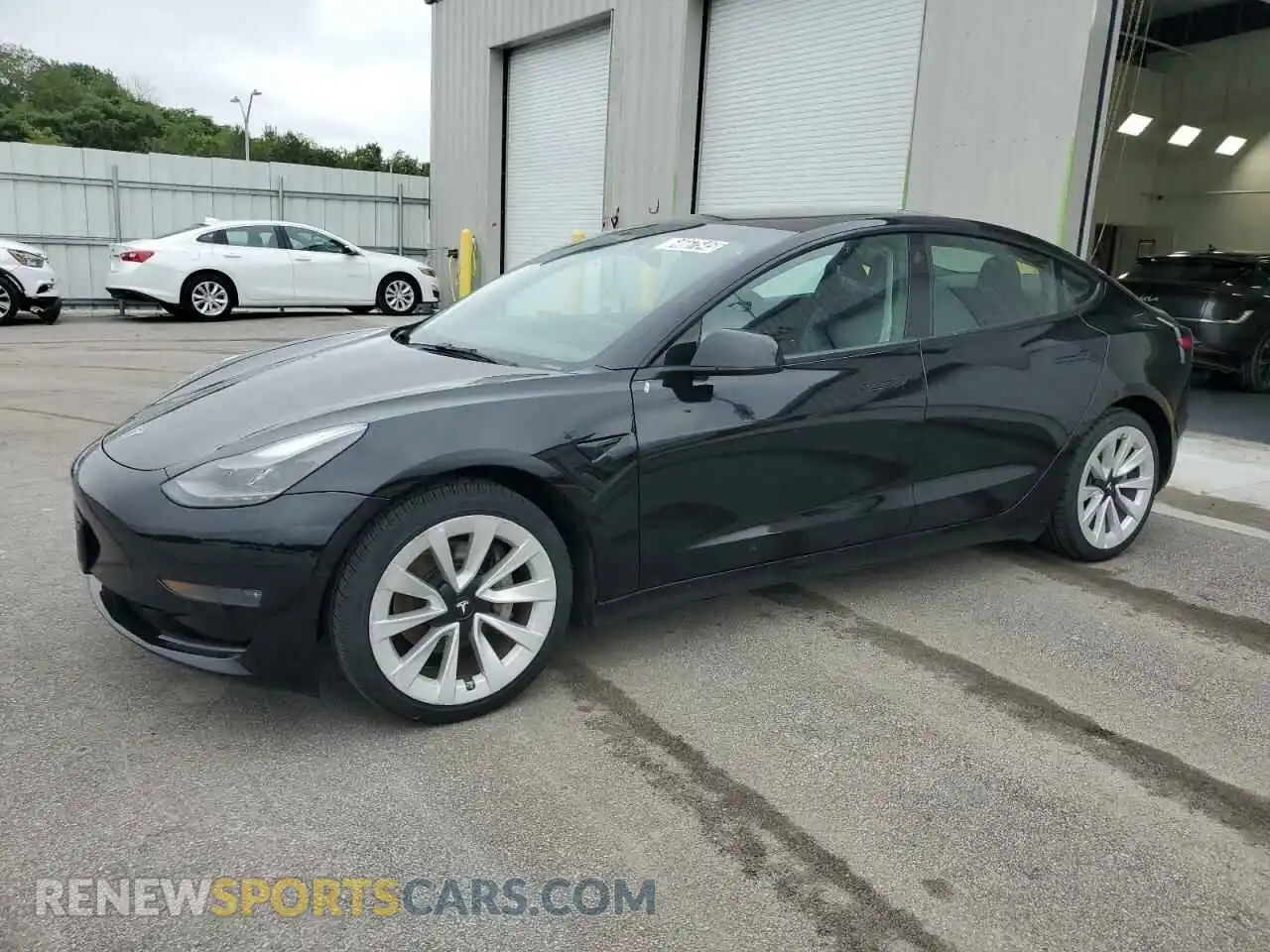 1 Photograph of a damaged car 5YJ3E1EB5NF288959 TESLA MODEL 3 2022