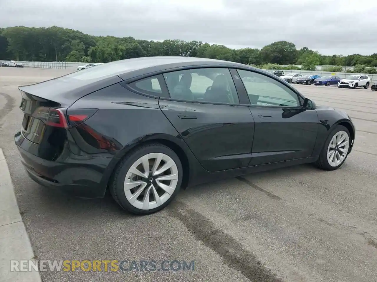 3 Photograph of a damaged car 5YJ3E1EB5NF288959 TESLA MODEL 3 2022