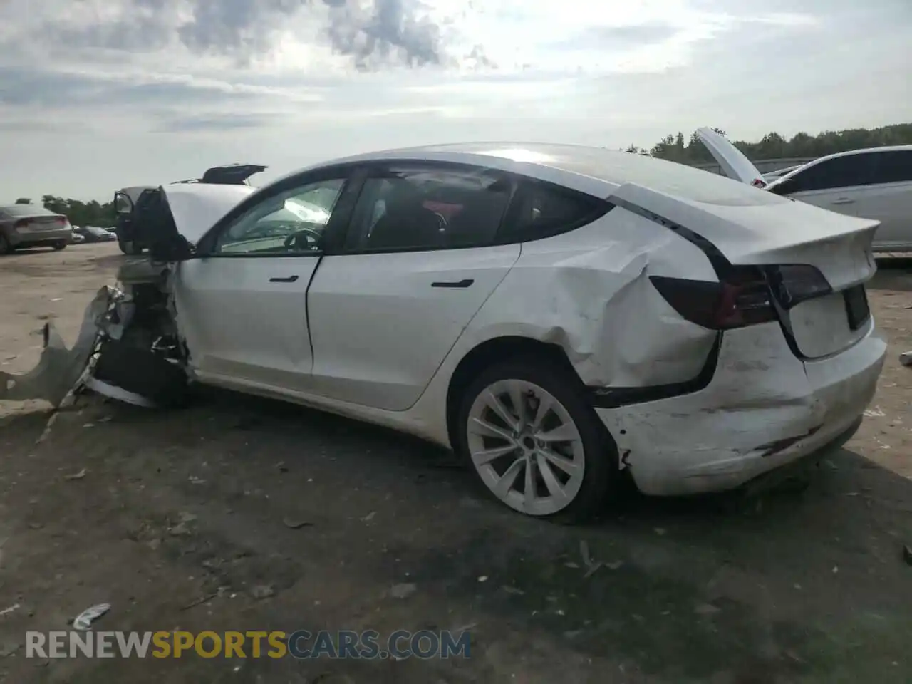 2 Photograph of a damaged car 5YJ3E1EB5NF290131 TESLA MODEL 3 2022