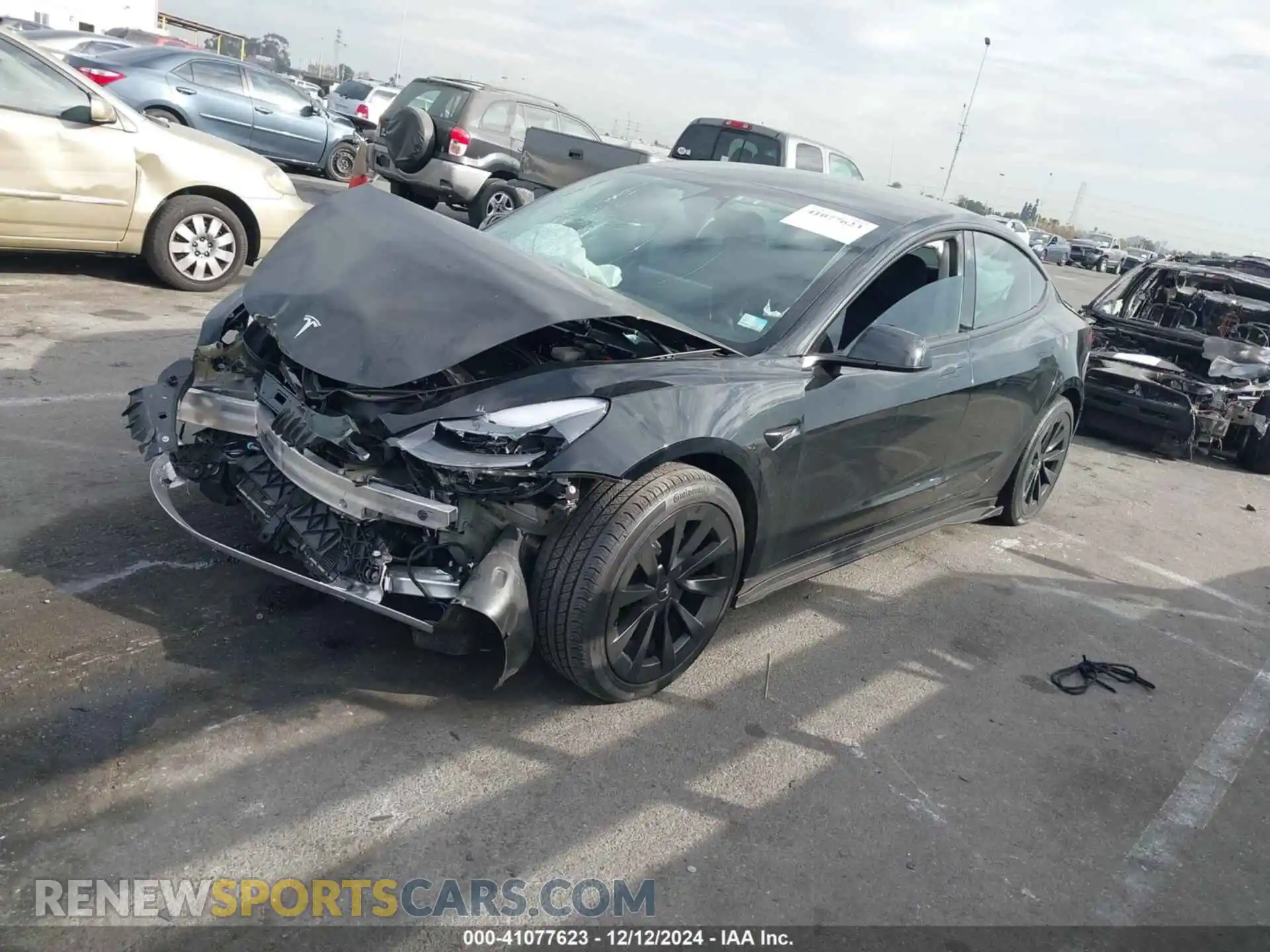 2 Photograph of a damaged car 5YJ3E1EB5NF290582 TESLA MODEL 3 2022