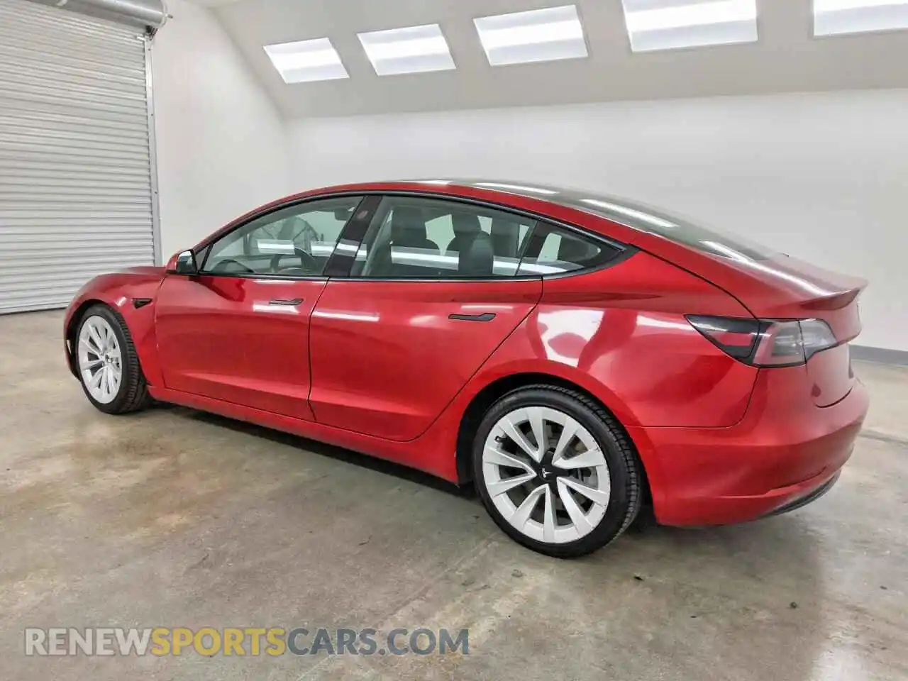 2 fotografías del automóvil dañado 5YJ3E1EB5NF305100 TESLA MODEL 3 2022