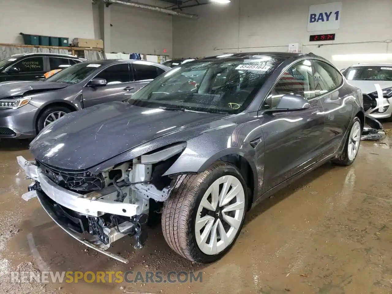 1 Photograph of a damaged car 5YJ3E1EB5NF317117 TESLA MODEL 3 2022