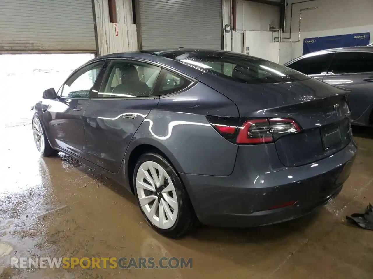2 Photograph of a damaged car 5YJ3E1EB5NF317117 TESLA MODEL 3 2022
